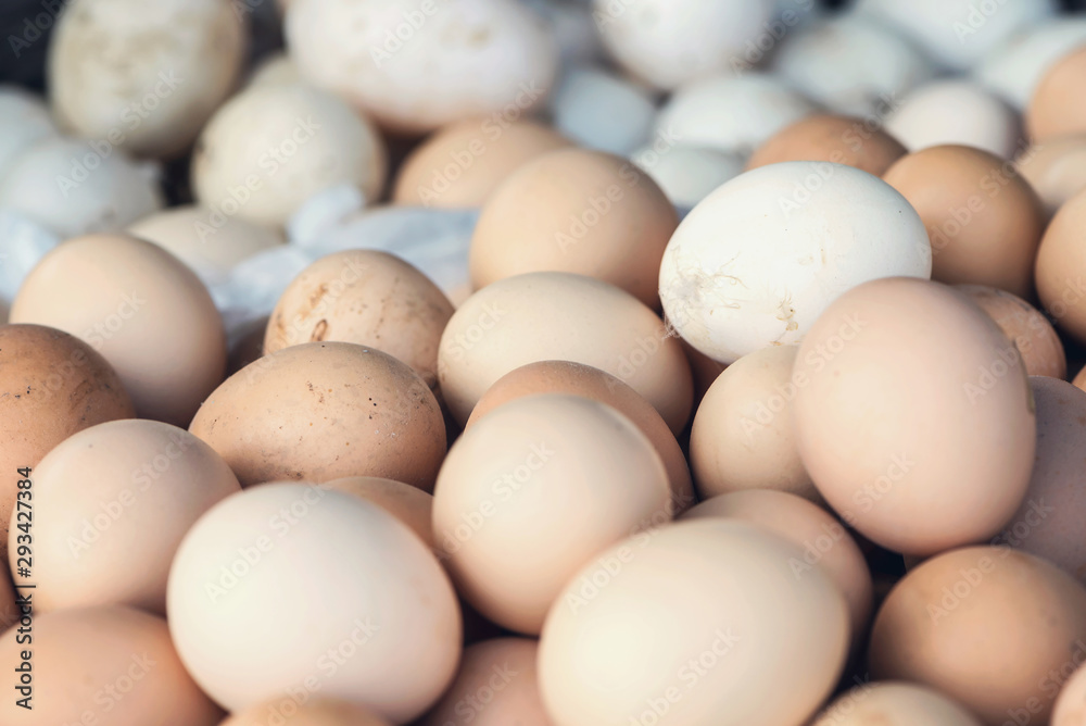 Lots of organic eggs on a market stall, outdoor, close up Lots of organic eggs on a market stall, outdoor, close up