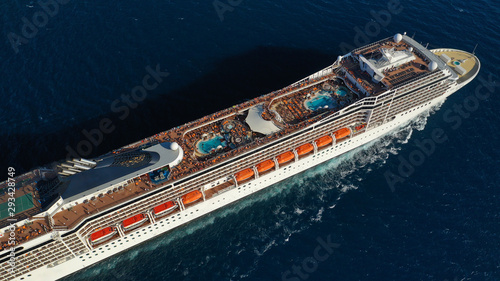 Aerial photo of large cruise liner ship cruising deep blue open ocean sea © aerial-drone