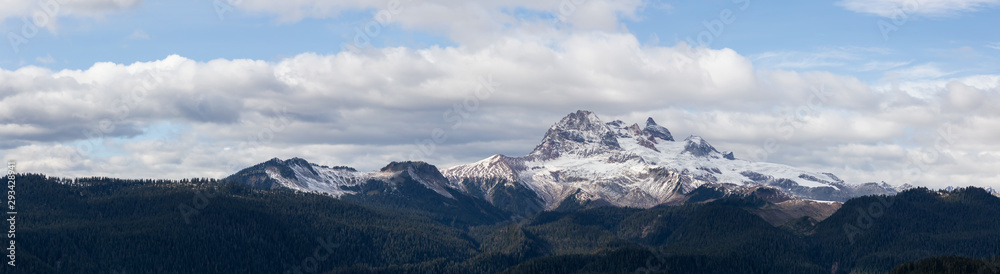 Fototapeta premium Beautiful Panoramic View of Canadian Mountain Landscape during a colorful and vibrant evening in Fall Season. Taken on a trail to Watersprite Lake near Squamish, North of Vancouver, BC, Canada.