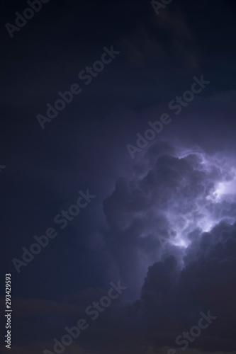 Clouds illuminated by lightning.