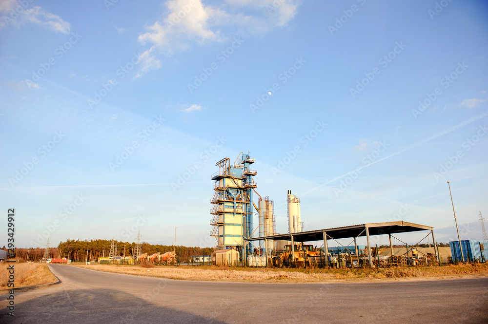 Fototapeta premium Modern industrial building over blue sky
