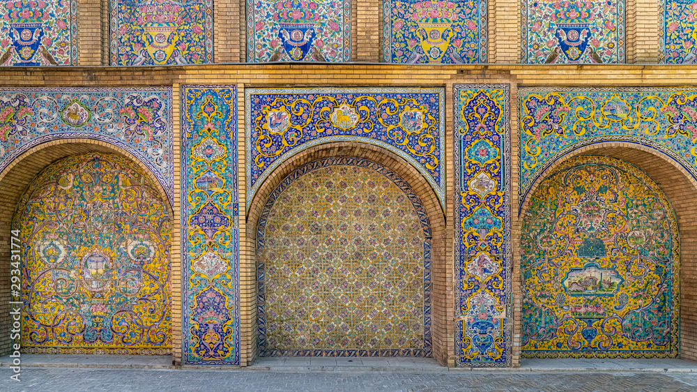 Colorful painting mosaic tiles on the wall at Golestan palace, Tehran, Iran