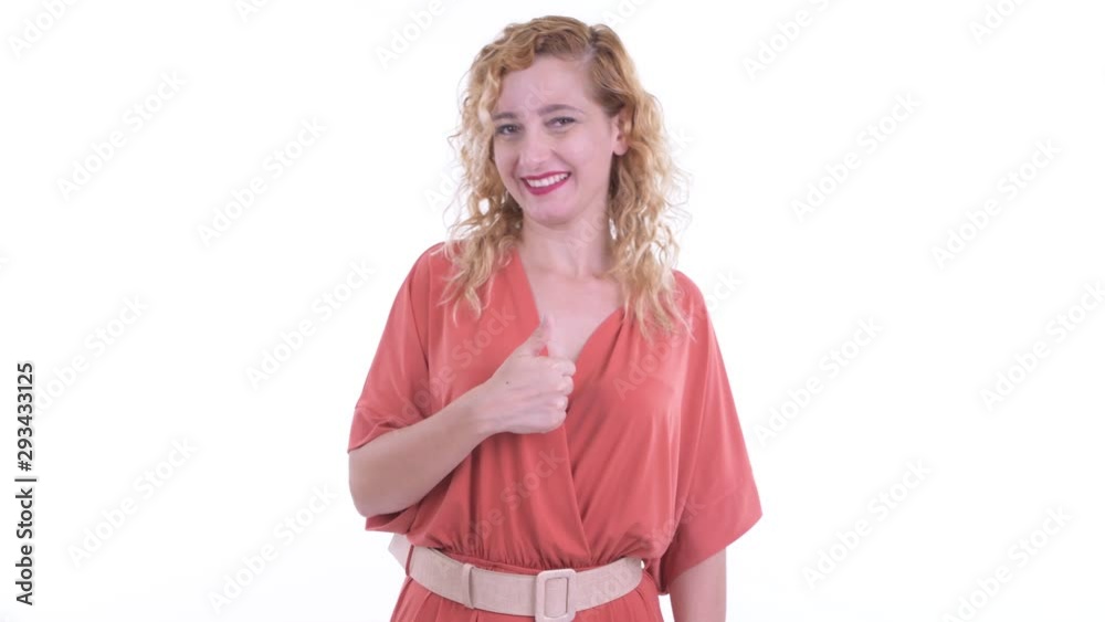 Happy beautiful blonde businesswoman giving thumbs up Happy beautiful blonde businesswoman giving thumbs up