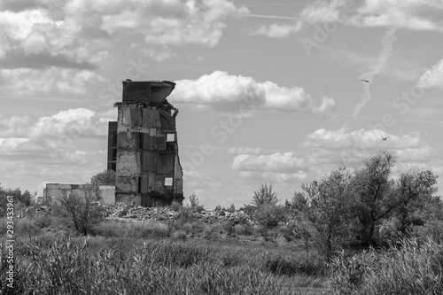 The remains of the ruins of the old building against cloudy sky