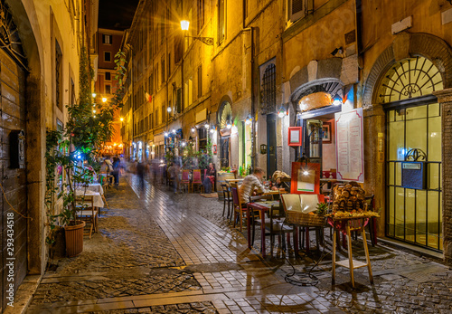 Fototapeta Naklejka Na Ścianę i Meble -  Night view of cozy street in Rome, Italy