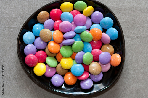 Colorful candies in a bowl.