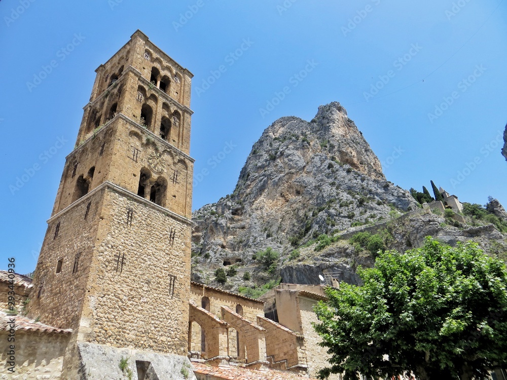 Moutiers-Saint-Marie city with chapel and mountains background in Provence Verdon national park 