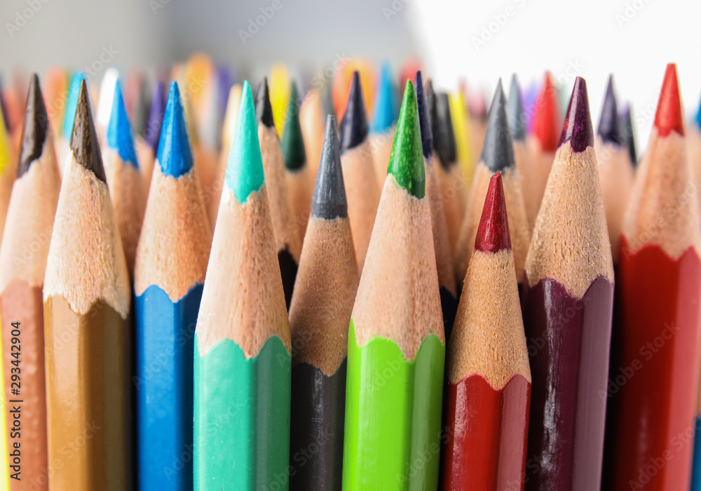 Different color pencils on white background, closeup view Different color pencils on white background, closeup view