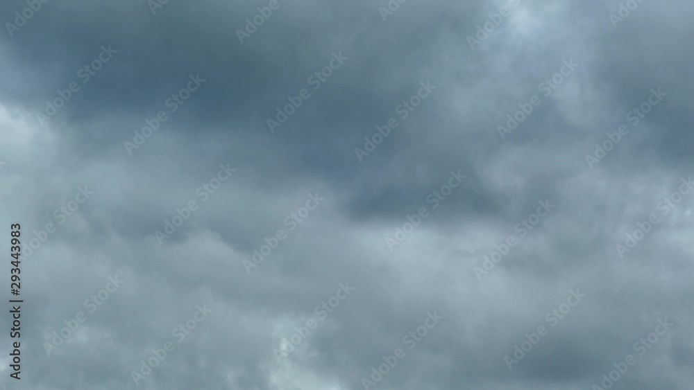Hurricane approaching. Black and gray clouds fly fast across the sky. The beginning of a storm and thunderstorm. Hurricane approaching. Black and gray clouds fly fast across the sky. The beginning of a storm and thunderstorm.