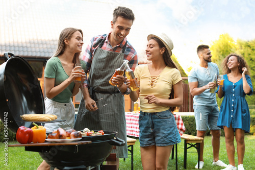 Photography Group of friends having fun at barbecue party outdoors