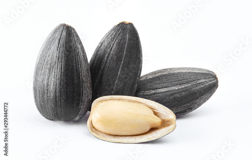 Fotografie, Obraz Close-up of delicious sunflower black seeds, isolated on white background