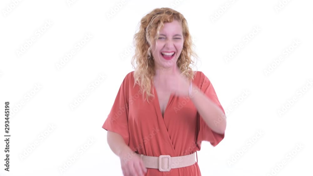 Happy beautiful blonde businesswoman laughing and pointing at camera Happy beautiful blonde businesswoman laughing and pointing at camera