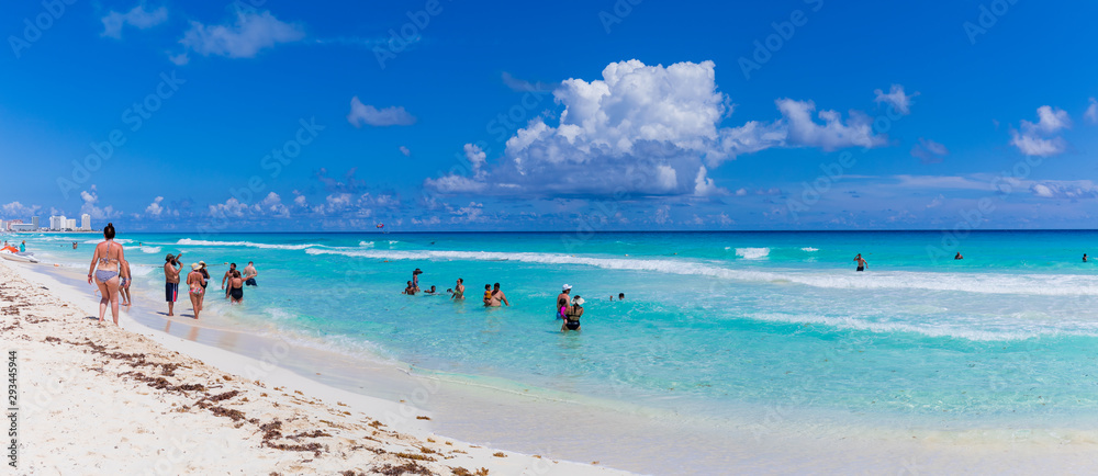 View of Cancun beach in Caribbean Sea. Exotic Paradise. Travel, Tourism and Vacations Concept View of Cancun beach in Caribbean Sea. Exotic Paradise. Travel, Tourism and Vacations Concept