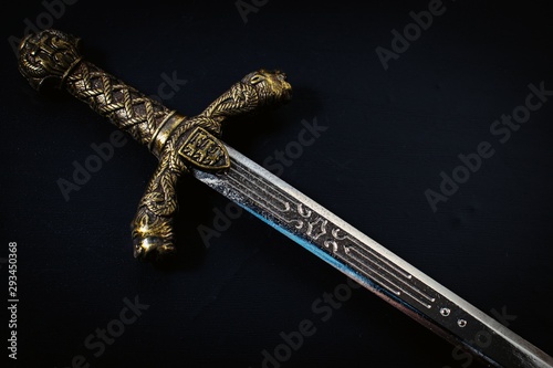 Knight sword on a black background