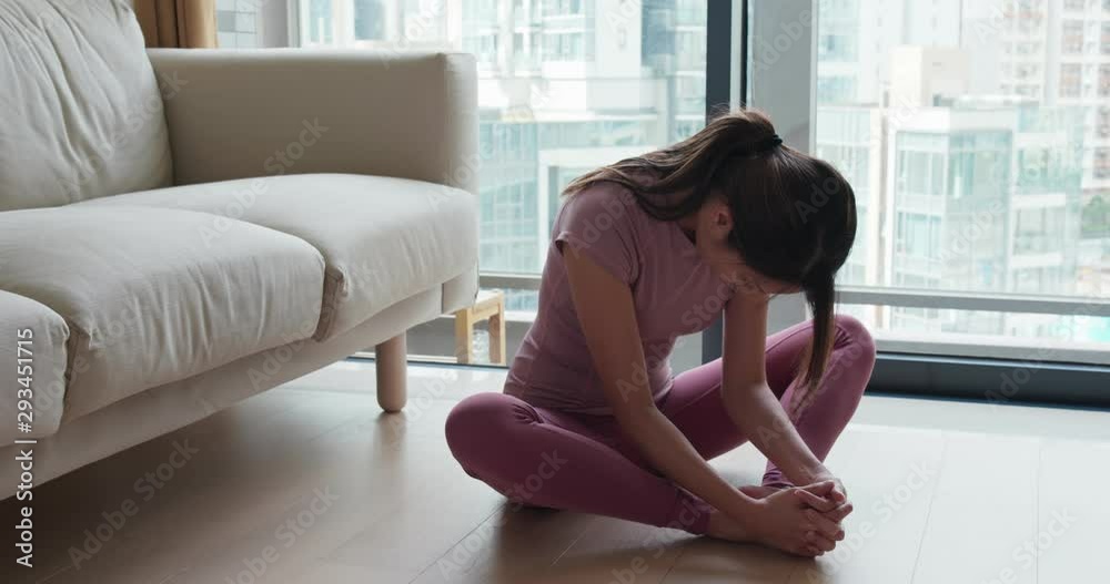 Woman stretch legs at home Woman stretch legs at home