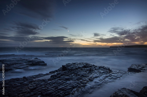 sunset over the sea photo