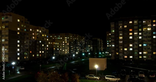 Wallpaper Mural Night panorama time lapse of light in windows of multistory buildings. life in big city Torontodigital.ca