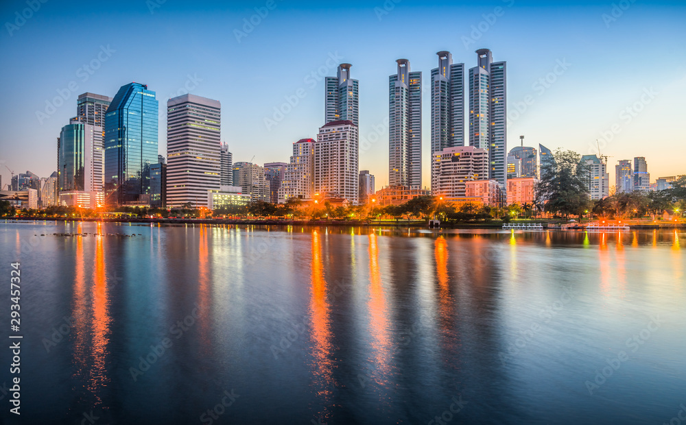 Lake in City Park under Skyscrapers at Twilight. Benjakiti Park in Bangkok, Thailand Lake in City Park under Skyscrapers at Twilight. Benjakiti Park in Bangkok, Thailand