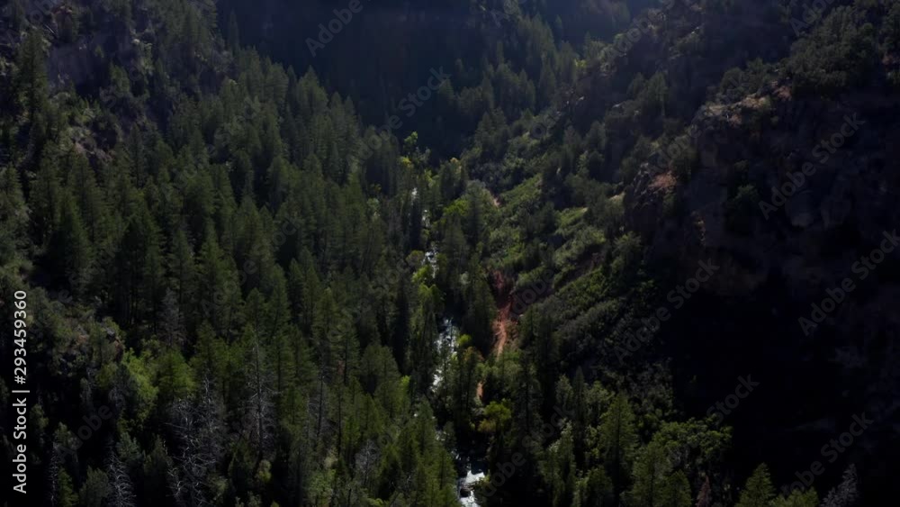 Aerial drone view of a beautiful river along a hiking trail on a warm sunny autumn day in Spanish Fork canyon in Utah Aerial drone view of a beautiful river along a hiking trail on a warm sunny autumn day in Spanish Fork canyon in Utah
