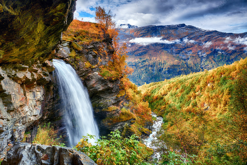 Beautifull waterfall in autumn scenery