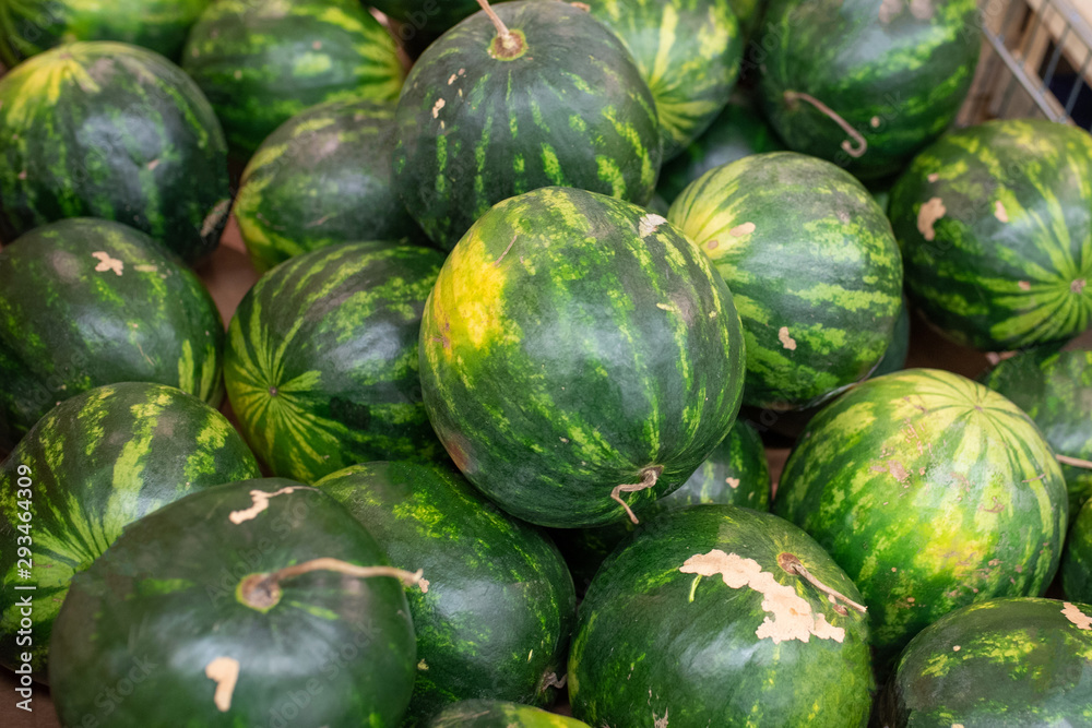 Small pitted a watermelons in a supermarket. Small pitted a watermelons in a supermarket.