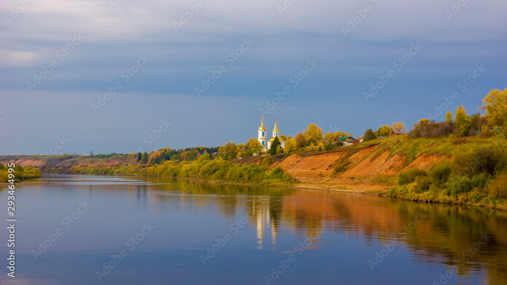 autumn landscape river, golden domed small church
