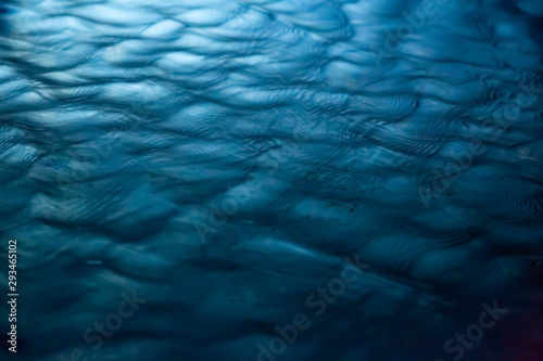 Full frame shot of rippled water in swimming pool at night photo