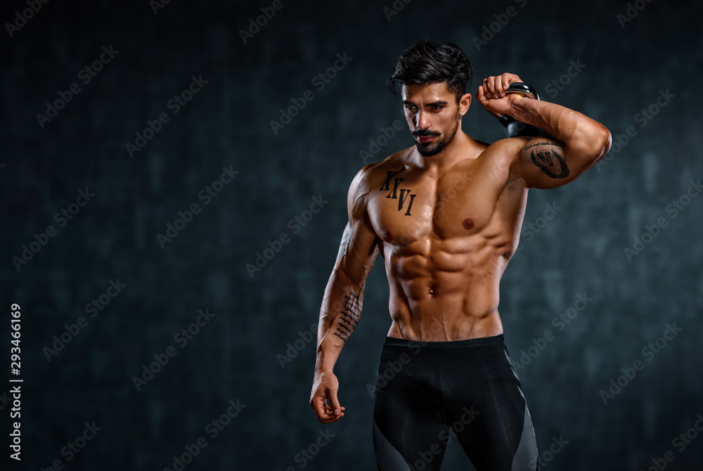 © mrbigphoto - Handsome Bodybuilder Exercising With Kettlebell © mrbigphoto - Handsome Bodybuilder Exercising With Kettlebell