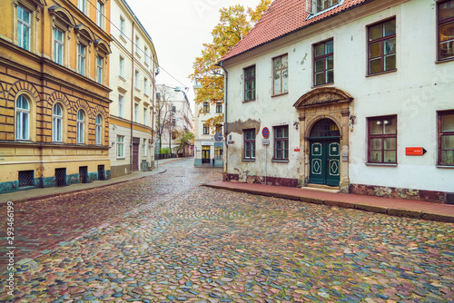 Historic street in the old town close to St Peters church, Riga, Latvia photo