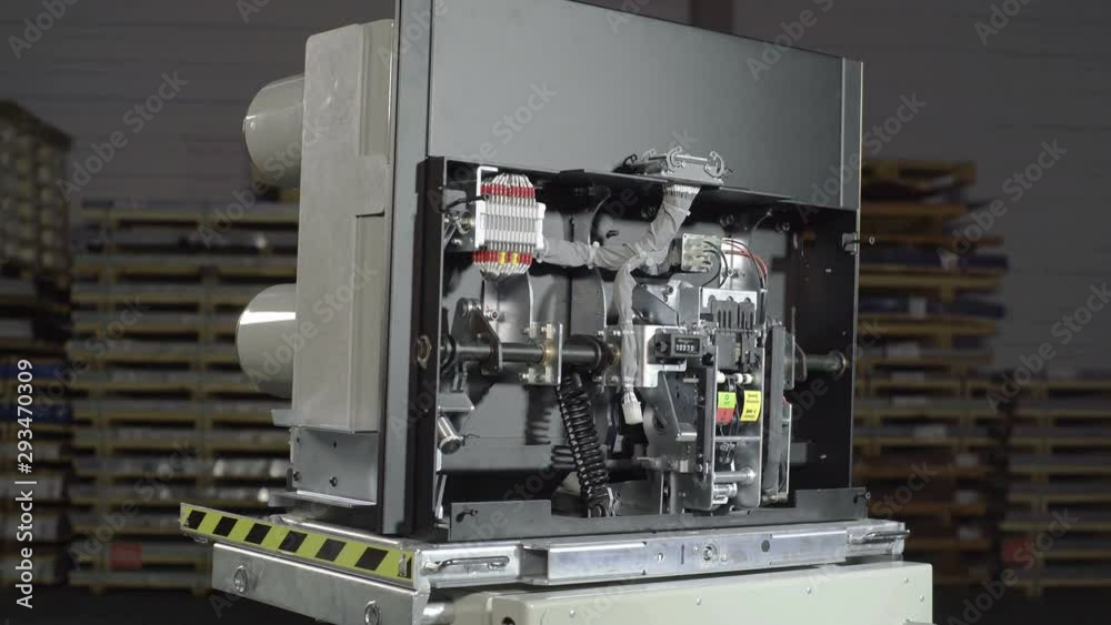 Automatic vacuum circuit breaker, fuses in a big industrial electric rack. Automatic vacuum circuit breaker, fuses in a big industrial electric rack.