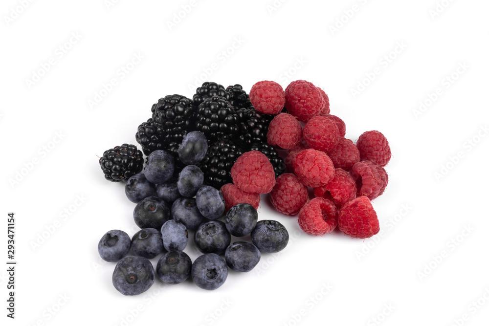 A set of blackberries, blueberries and raspberries laying on white background A set of blackberries, blueberries and raspberries laying on white background