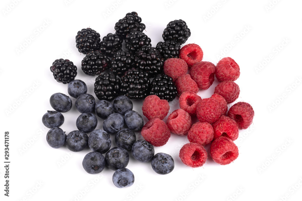 Top view on blackberries, blueberries and raspberries laying on white background Top view on blackberries, blueberries and raspberries laying on white background