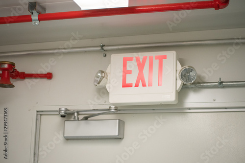 Emergency exit sign into a the industry room.