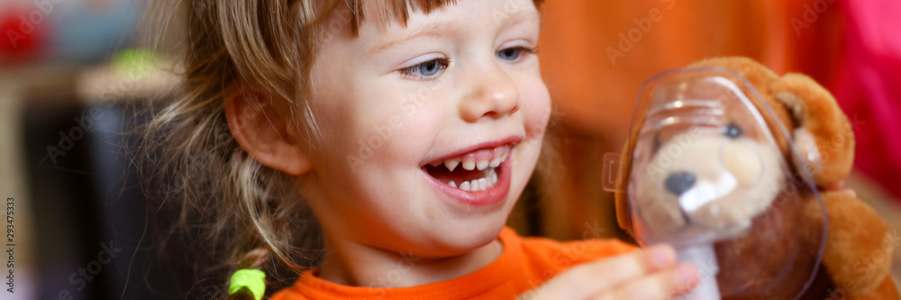 Happy child makes inhalation at home for cough health Happy child makes inhalation at home for cough health