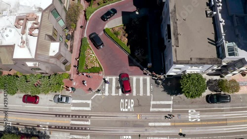 Aerial panoramic view of Lombard Street, an east–west street in San Francisco, CA. Famous for steep, one-block section with eight hairpin turns. Crookedest, steep hills, sharp curves, one-way road.