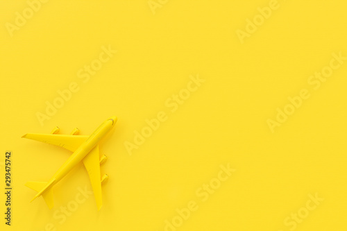 Airplane on yellow background.