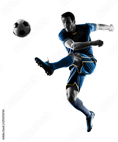 one caucasian soccer player man playing kicking in silhouette isolated on white background
