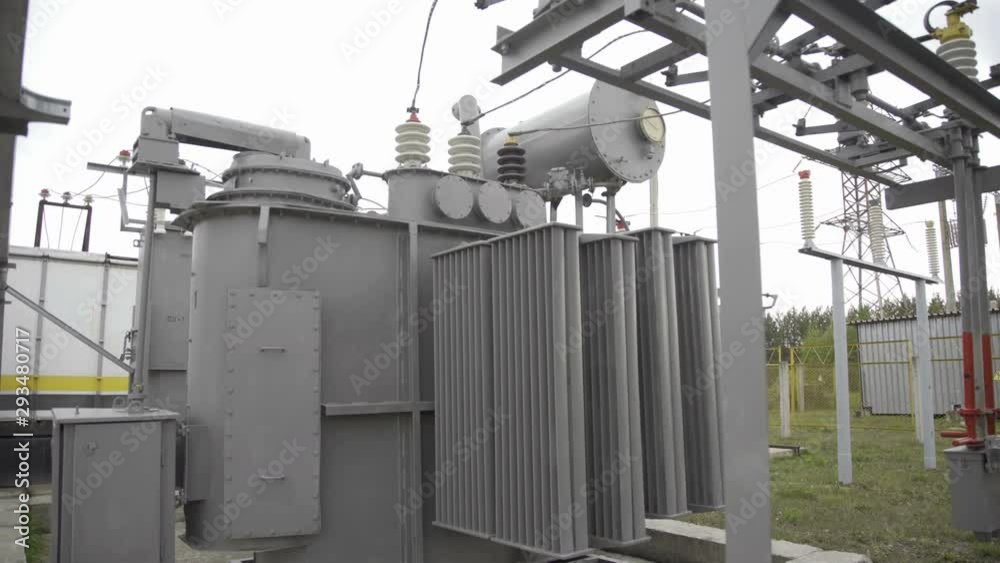 High voltage transformer equipment at the electrical power substation. High-voltage circuit breaker. High voltage switch