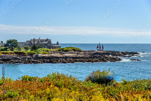 Fototapeta Naklejka Na Ścianę i Meble -  A Three Sail Sailboat Sailing in Front of Walkers Point in Kennebunkport Maine  