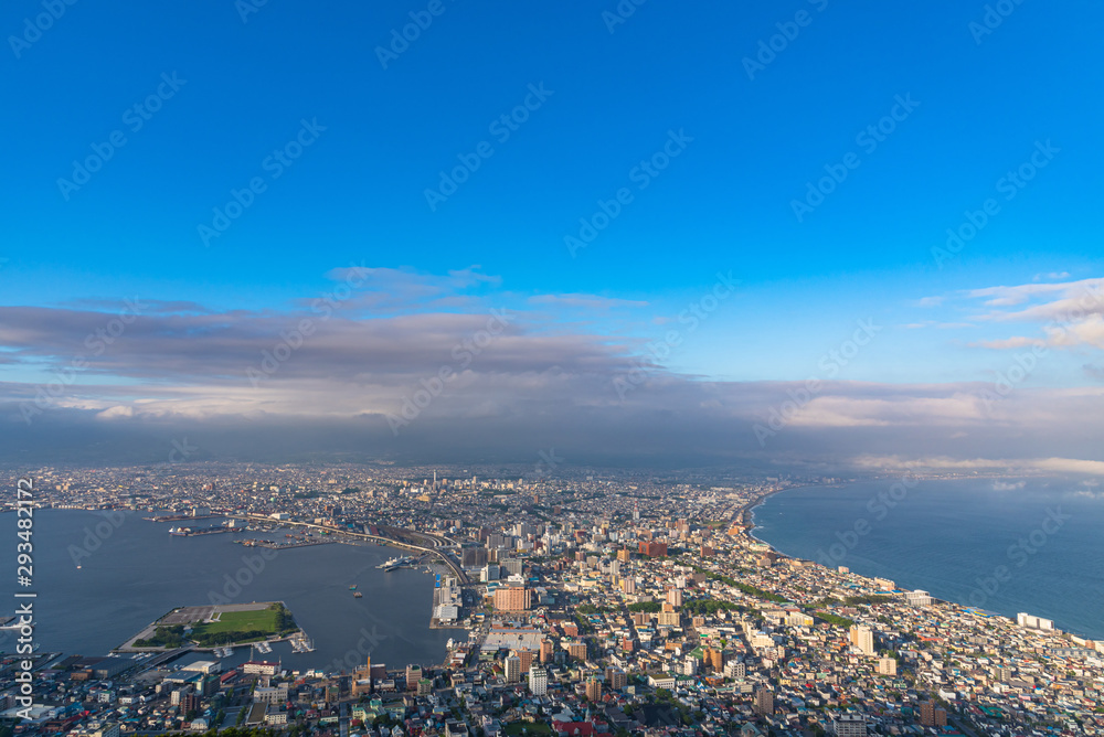 View from Mt. Hakodate observation deck in sunny day, the expansive vista during daytime is spectacular. A famous three star rating sightseeing spot in Hakodate City, Hokkaido, Japan