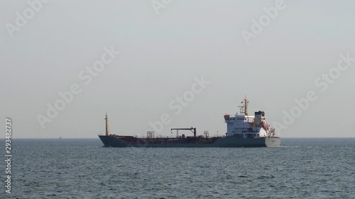 Container Cargo Ship in Sea at summer day