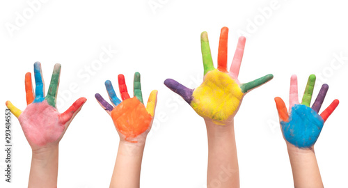 Close up at four children's hands painted isolate on white background with clipping path.