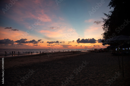 beach sunset silhouette islands beautiful beach sandy on the tropical sea summer colorful orange and blue sky mountain