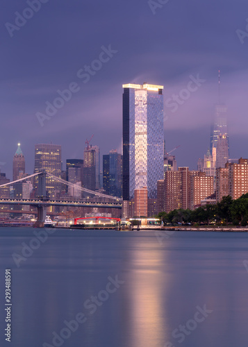 View on Financial District with Two bridges at sunrise with long exposure