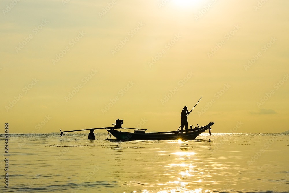 Thai fisherman at sunset