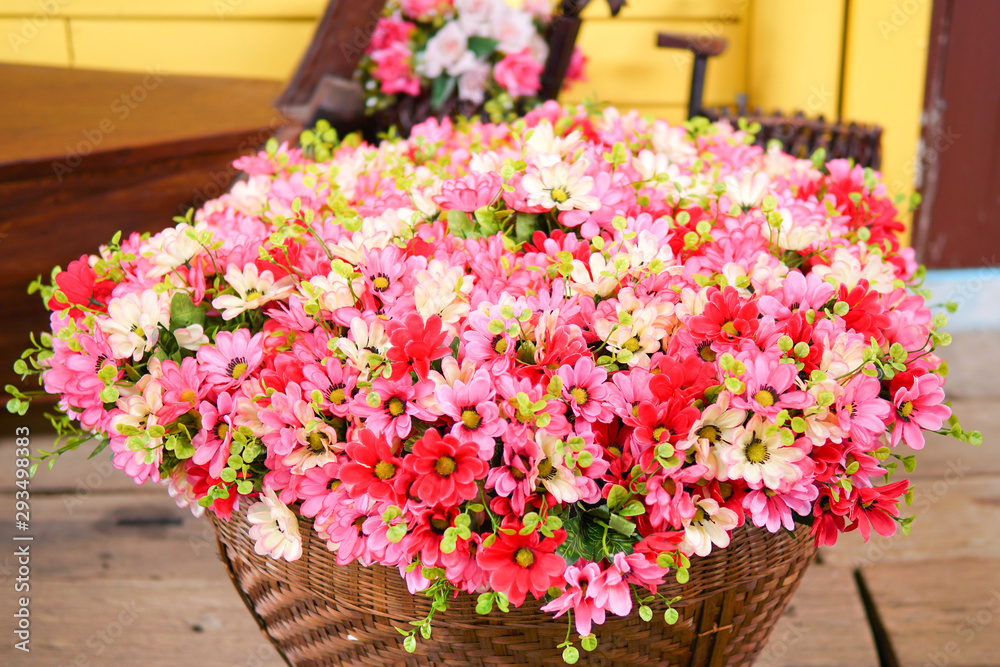 Fake flower and Floral background. rose flowers made of fabric. The fabric flowers bouquet. Colorful of decoration artificial flower