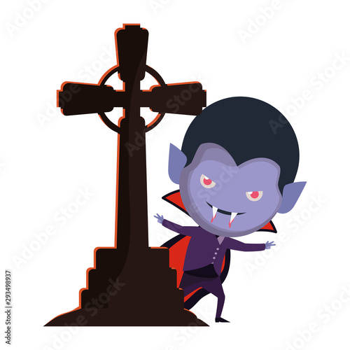 cute little boy with dracula costume and graveyard