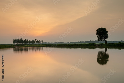 olourful Sunset over lake near Jagdalpur,Chhattisgarh,India photo