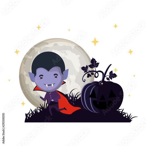 cute little boy with dracula costume in dark night scene
