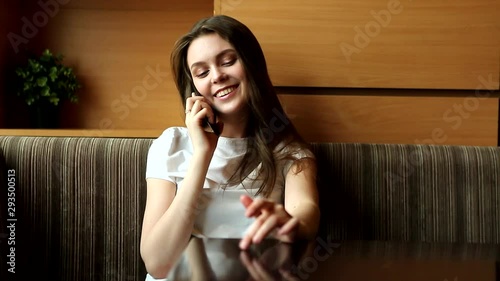 attractive young girl in a cafe